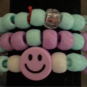 Bracelet set of three, purple and blue themed.